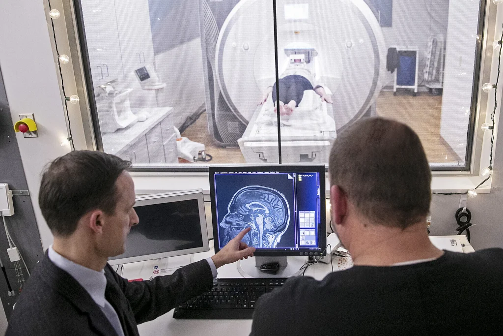 Doctors examining an MRI scan
