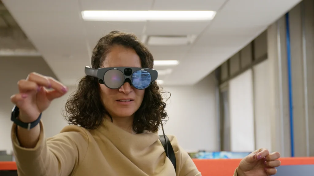UF researcher Karla Saldana Ochoa using the augmented reality headset.