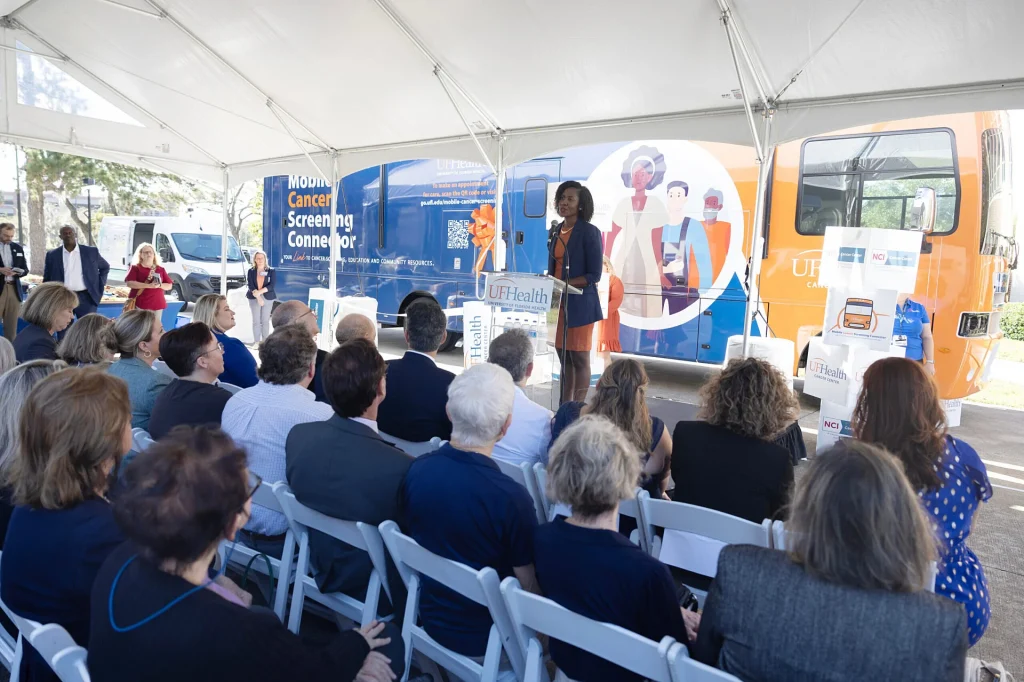 Press event in front of UF Health mobile vehicle