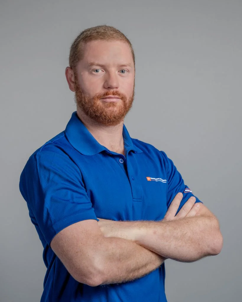 Austin Evans poses for a headshot