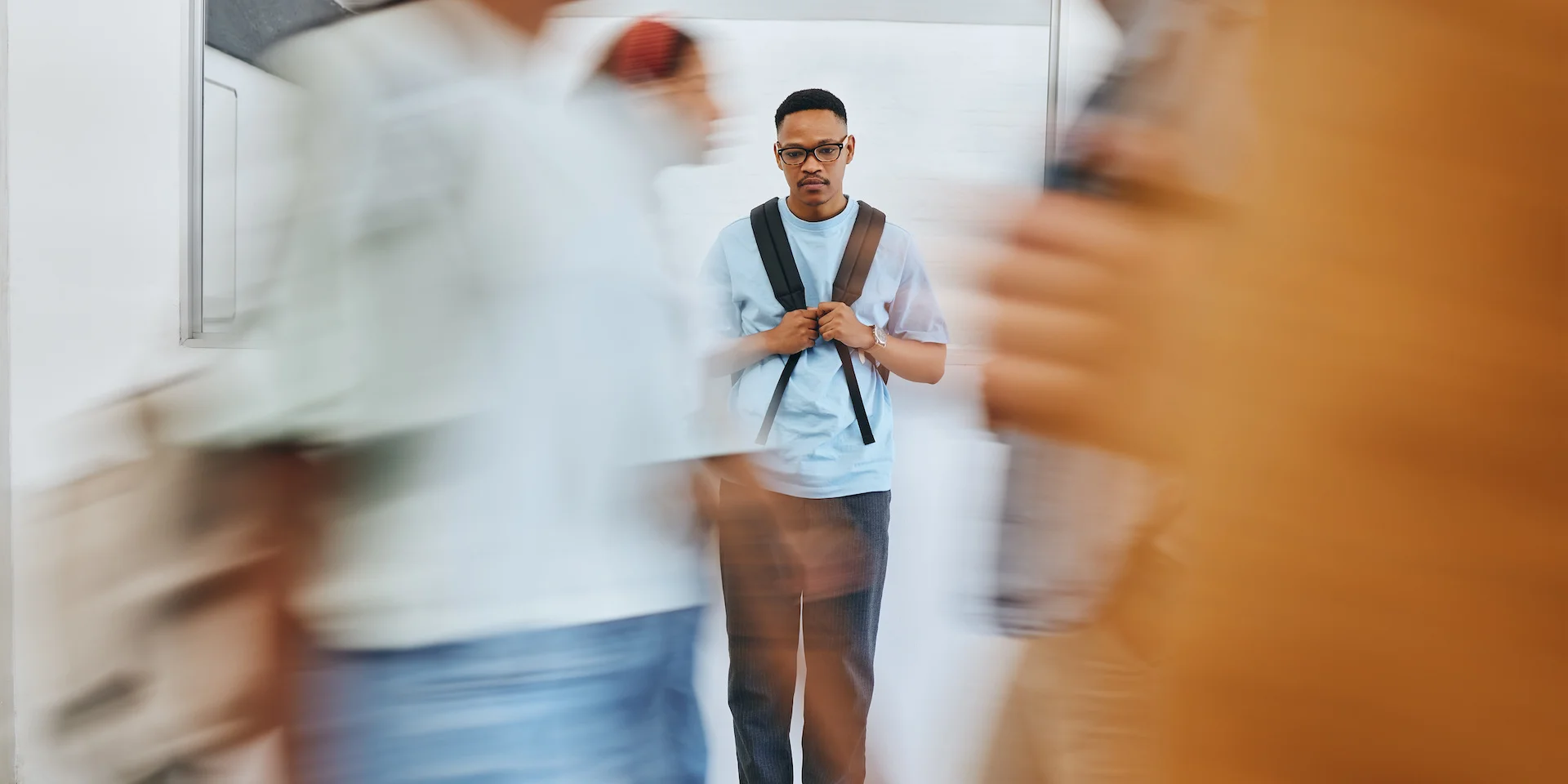 A student walks through a hallway